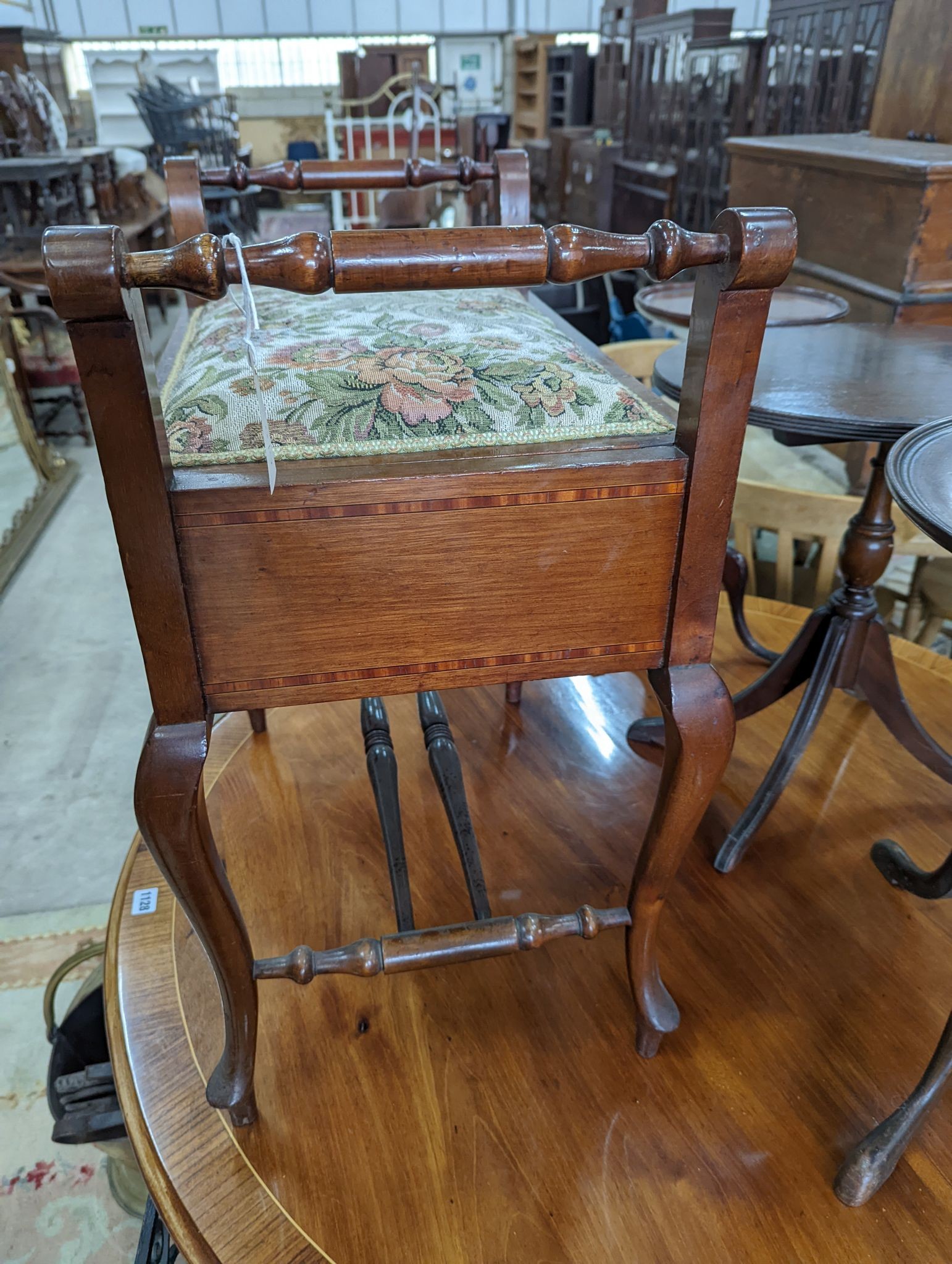 An Edwardian inlaid mahogany piano stool